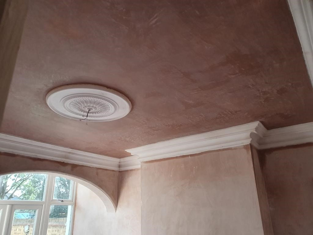 close up of a wall and ceiling with fibrous coving