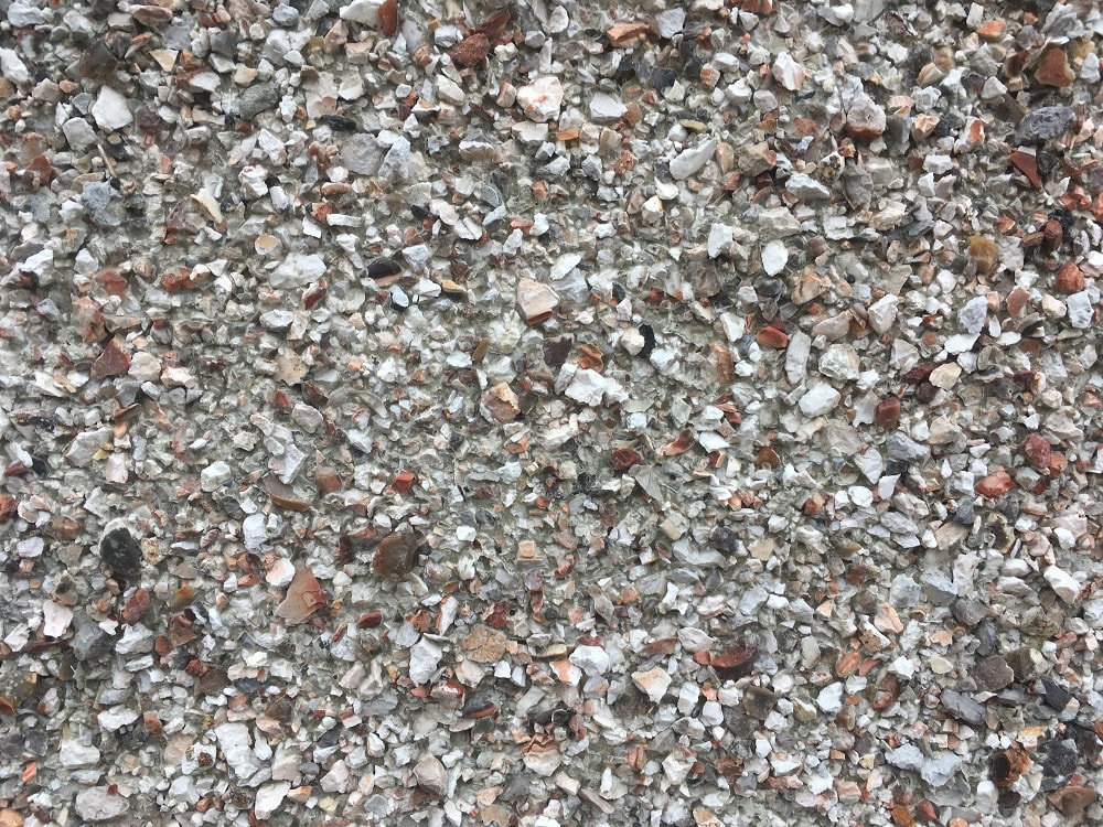 close up of a wall with a pebble dash finish