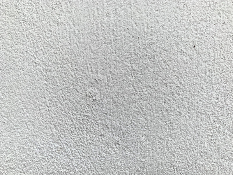 close up of a wall with a silicone render finish