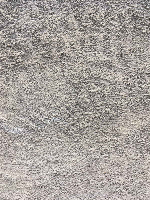 close up of a wall with a textured finish